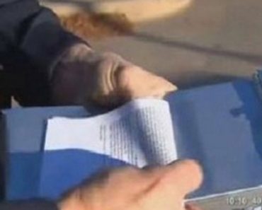 When A Cop Gives This Guy A Ticket, There’s Something Inside As He Opens It Up